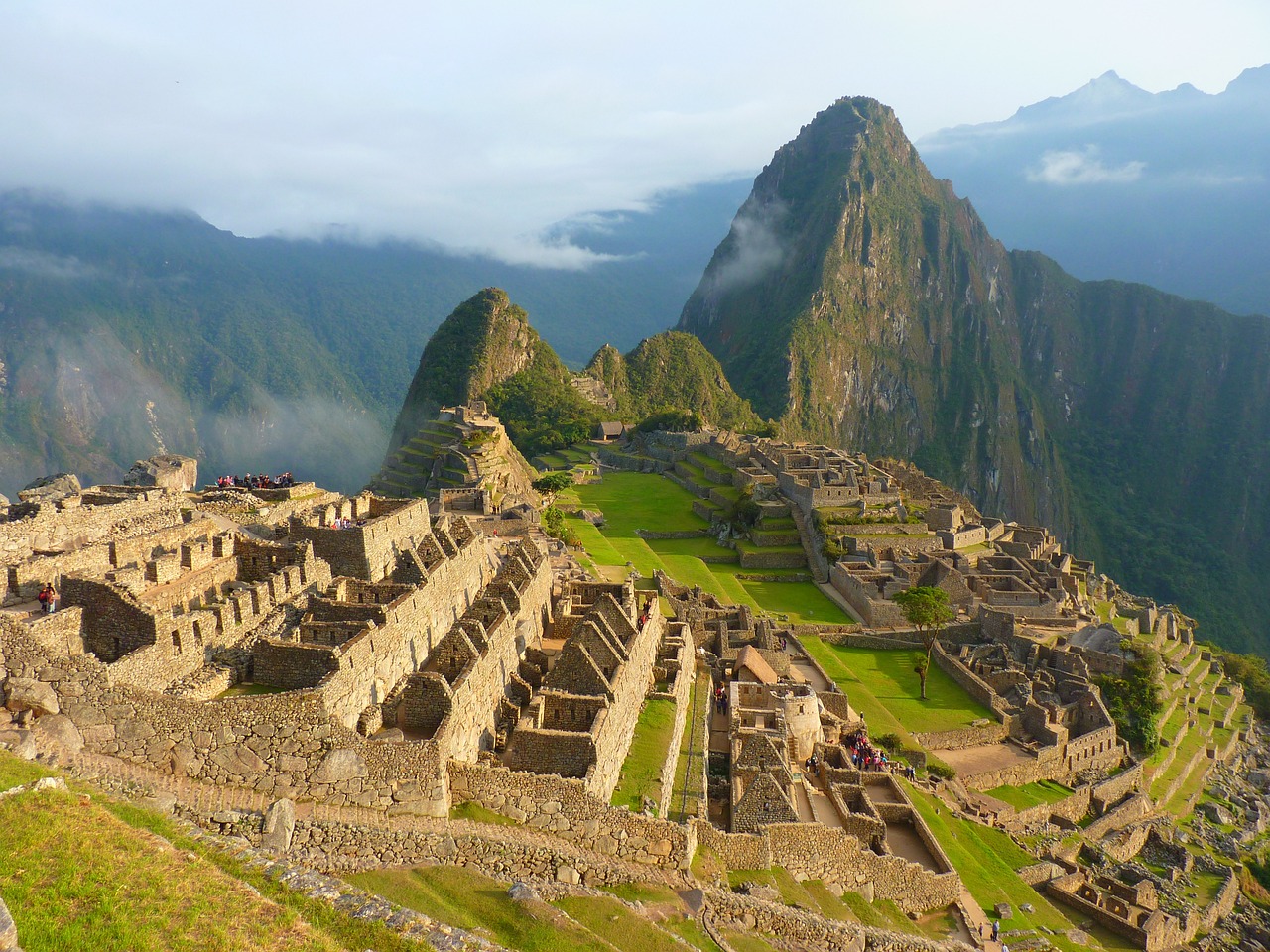 What ancient sites can you visit on a private tour in Peru?